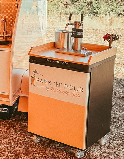 Park 'n' Pour branded kegerator on wheels with twin taps